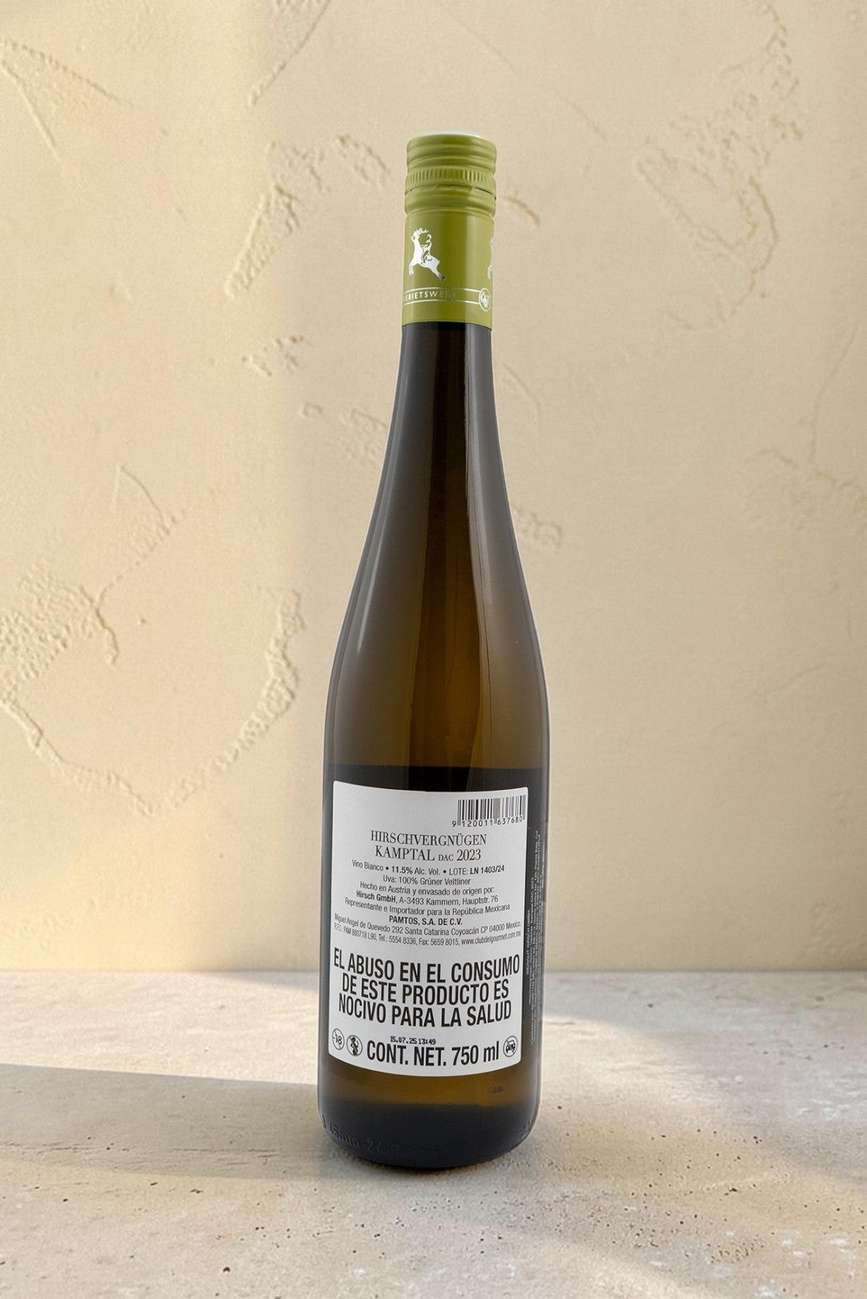 Botella de vino blanco Wellnex Hirsch VB Gruner Veltliner Kamptal con etiqueta trasera informativa