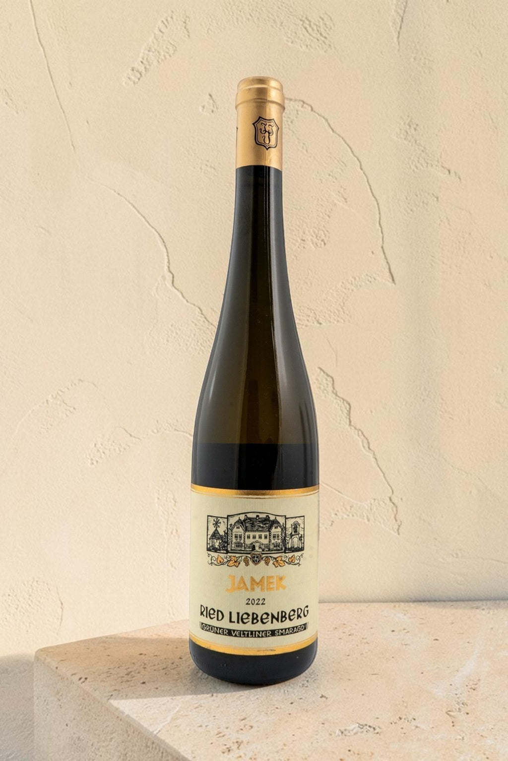 Botella de vino blanco Wellnex Jamek Ried Liebenberg Gruner Veltliner Smaragd 2022 con etiqueta clásica