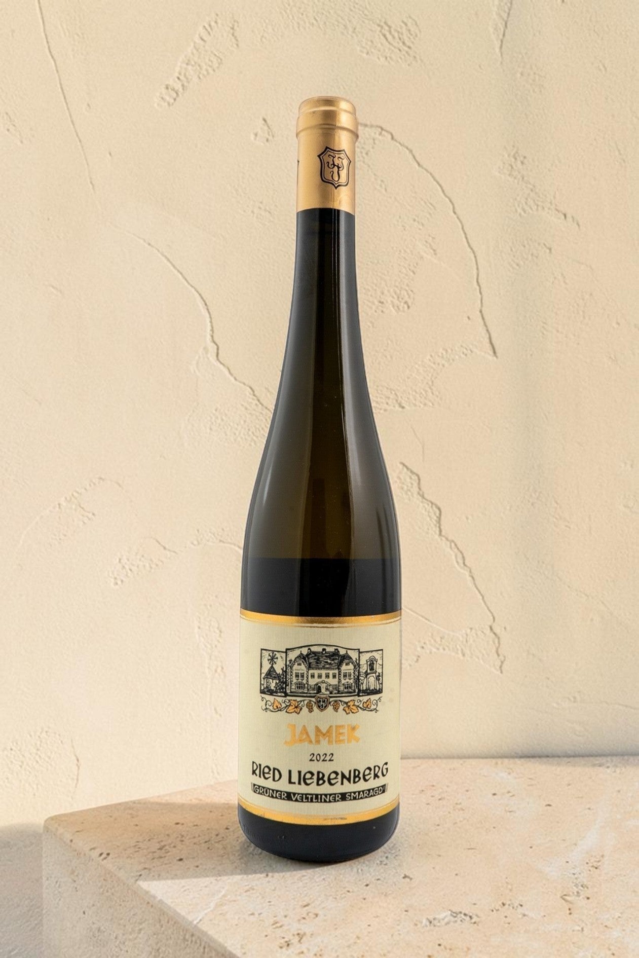 Botella de vino blanco Wellnex Jamek Ried Liebenberg Gruner Veltliner Smaragd 2022 con etiqueta clásica