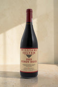Botella de vino tinto Pinot Noir Wellnex Russian River Valley 2022 con etiqueta clásica sobre fondo neutro.