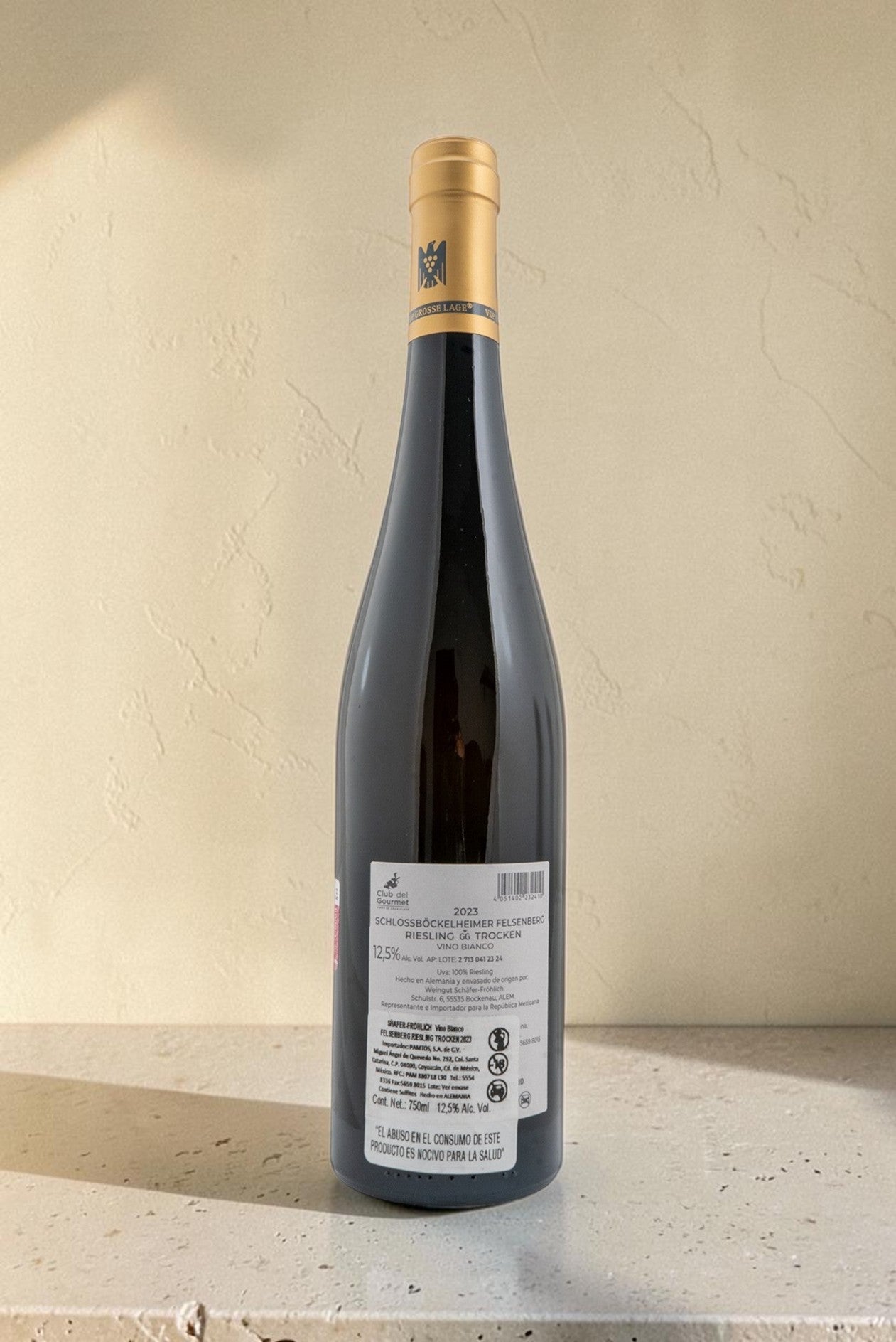 Botella de vino blanco Wellnex Schafer Frohlic Felsenberg Riesling Trocken 2023 con etiqueta informativa