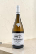 Botella de vino blanco Wellnex Gran Reserva con etiqueta elegante sobre fondo neutro