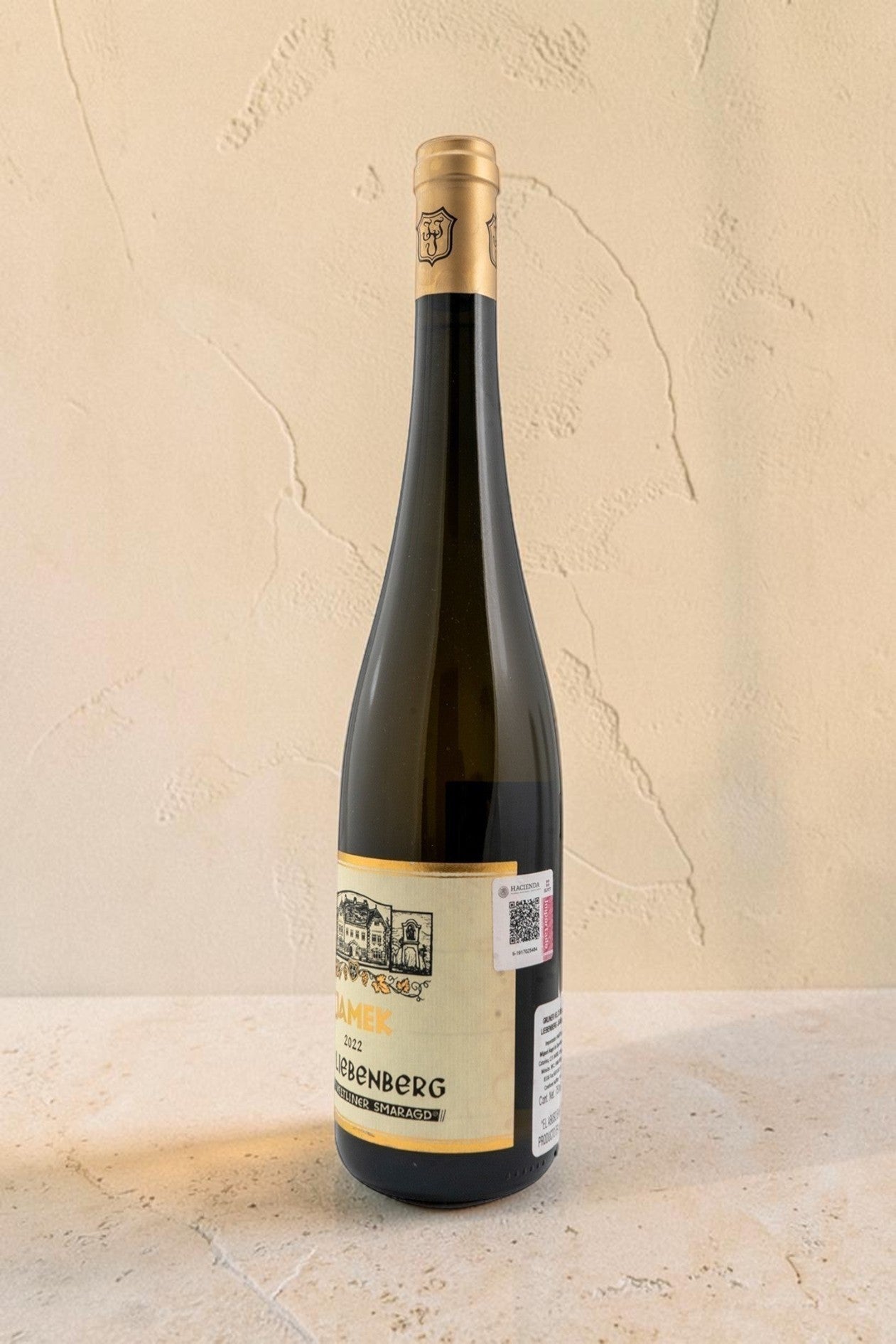 Botella de vino blanco Wellnex Weingut Jamek Ried Liebenberg Gruner Veltliner Smaragd con etiqueta clásica