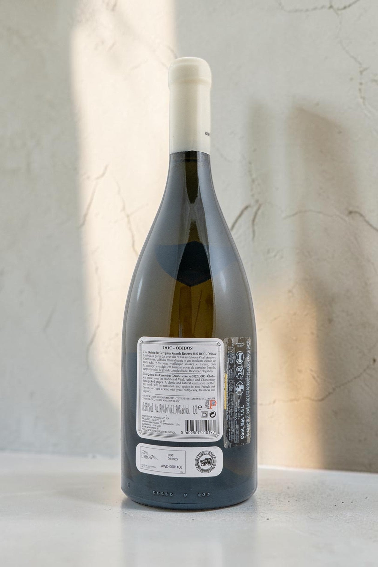 Botella Magnum de vino blanco Wellnex Gran Reserva con etiqueta informativa detallada sobre fondo neutro