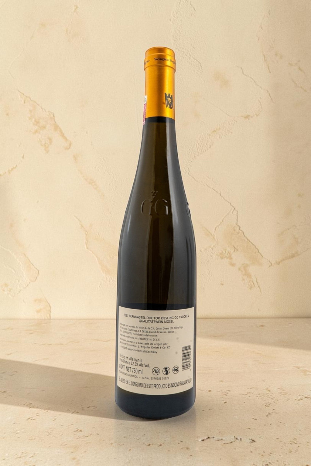 Botella de vino blanco Wellnex Weingut Wegeler Bernkasteler Doctor Riesling GG Trocken con etiqueta trasera detallada