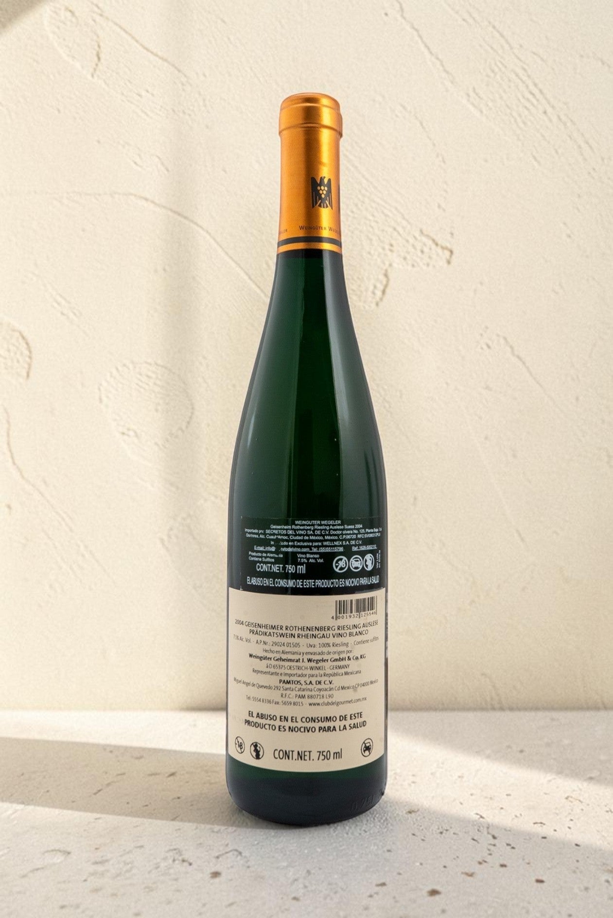Etiqueta trasera de vino blanco Wellnex Weingut Wegeler Riesling Auslese 2004 con detalles técnicos y de importación