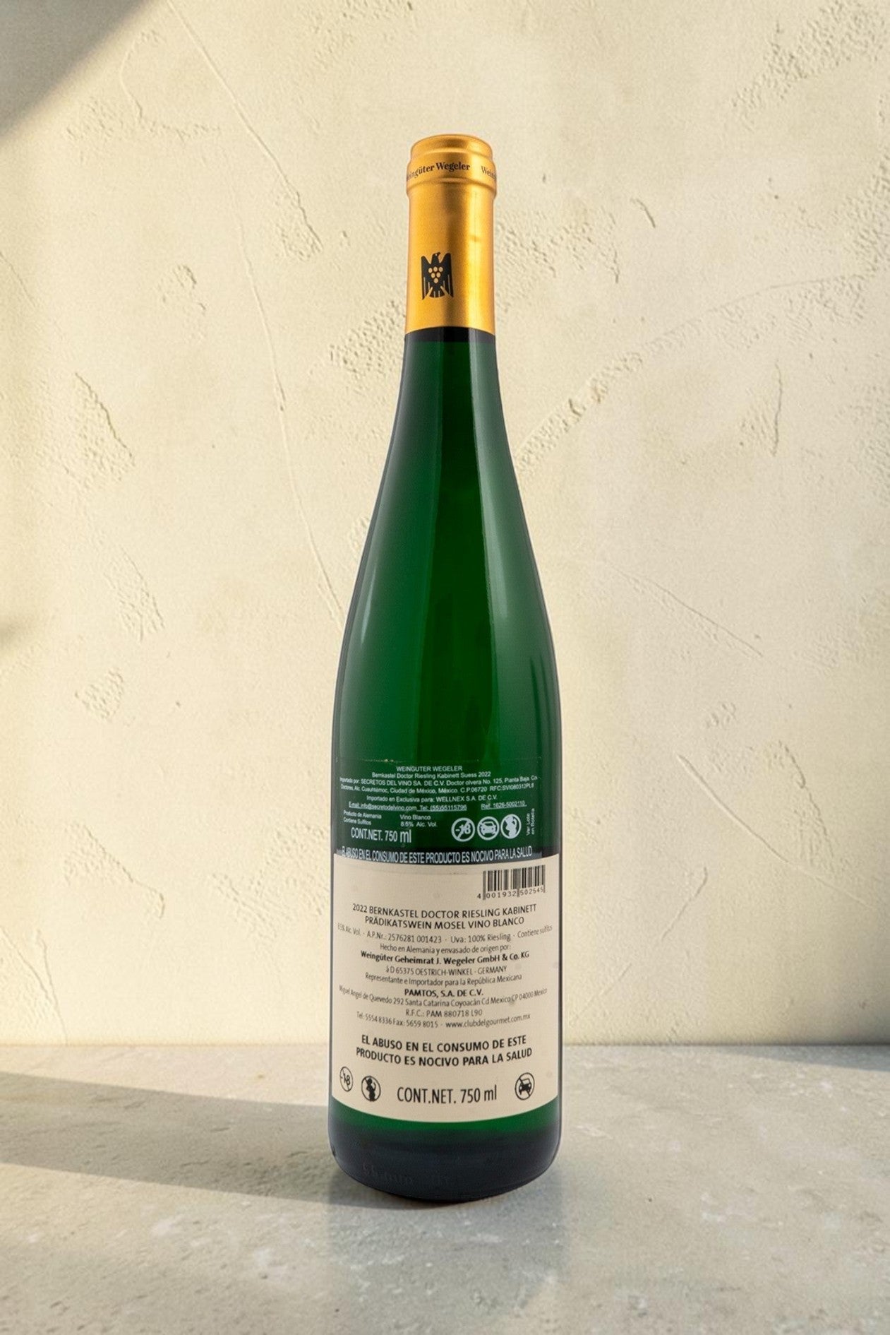 Etiqueta trasera de la botella de vino blanco Wellnex Weingut Wegeler Bernkasteler Doctor Riesling Kabinett